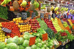 A fruit and vegetable market stall (Mercat de St. Josep (Boqueria), Las Ramblas, Barcelona, Spain)
