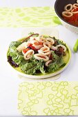 Mixed salad with calamari and peppers