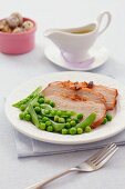 Roast ham with peas