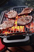 Turkey steaks on barbecue
