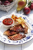 Barbecued pork chops with tomato sauce