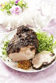 Roast pork with herb crust and mustard for Easter