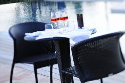 Laid table with glasses of rosé wine