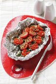 Grilled tomatoes in aluminium foil