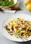 Ribbon pasta with peas and bacon