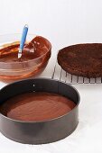 Making chocolate mousse cake (cake mixture in springform pan)