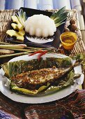 Mackerel in banana leaf with sago and coconut pudding