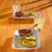 Pumpkin blinis with chili dip