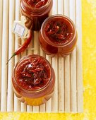 Strawberry and chili jam in jam jars