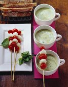 Potato and basil soup and mozzarella and tomato skewers