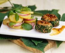 Chestnut burgers with potatoes and corn salad