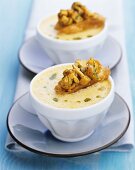 Two cups of chanterelle soup with crostini