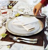Place-setting in shades of white and brown