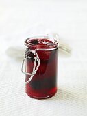 Strawberry jam in preserving jar