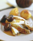 Chicken breast with stuffing, mushrooms & roast potatoes