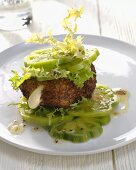 Fried Camembert on green tomato salad