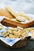 Focaccia with dill and spinach rolls in basket