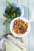 Sweet potato salad with herbs, cashew nuts and ginger dressing