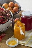Berry jelly and apricot jam