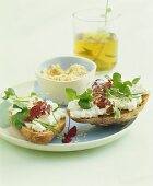 Soft cheese and herbs on bread