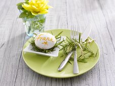 Place-setting with boiled egg as place card