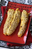 Banana fritters with sesame seeds