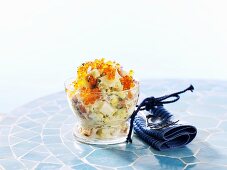 Salmon and potato salad with trout caviar