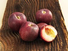 Red vineyard nectarines on a wooden surface