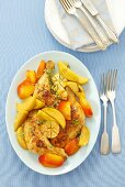 Oven baked chicken legs with apples, nectarines and garlic