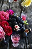 Fresh figs, rose tea and roses