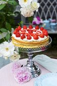Strawberry cake on cake stand