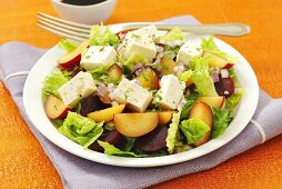 Salad with plums, beetroot and feta