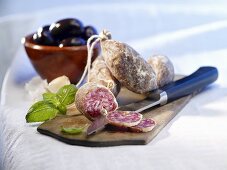 Italian salami with olives and basil