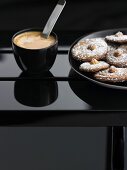 Coffee biscuits with a beaker of coffee
