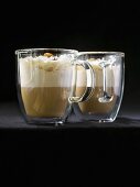 Eiskaffee (iced coffee drink) with brown sugar in two glass cups