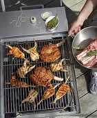 Meat and poultry on a barbecue