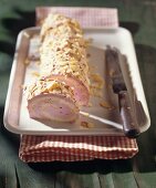 Cherry buttercream roulade with almonds