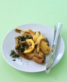 Pork chops with roasted parsnips and lemon