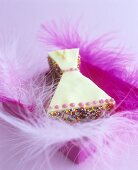 Iced cake (dress) with feathers