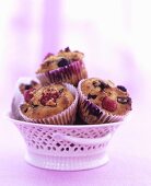 Muffins with dried fruit and raspberries