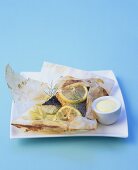 Sea bass with fennel and lemon en papillote, mayonnaise