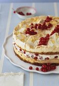 Meringue cake with mascarpone cream and redcurrants