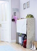 Garderobe mit Stauraum für Haushaltsgeräte