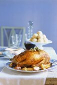 Stuffed goose with apples and potato dumplings