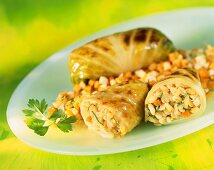 Cabbage leaves stuffed with pearl barley and carrots