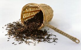 Bamboo tea strainer with tea leaves