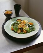 Spinach and vegetable salad with a cutlet of cochon de lait