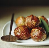 Meatballs with cranberries, wrapped in ham