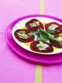 Beetroot carpaccio with Manchego cheese and pistachio oil