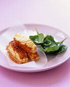 Piri piri haddock with spinach salad